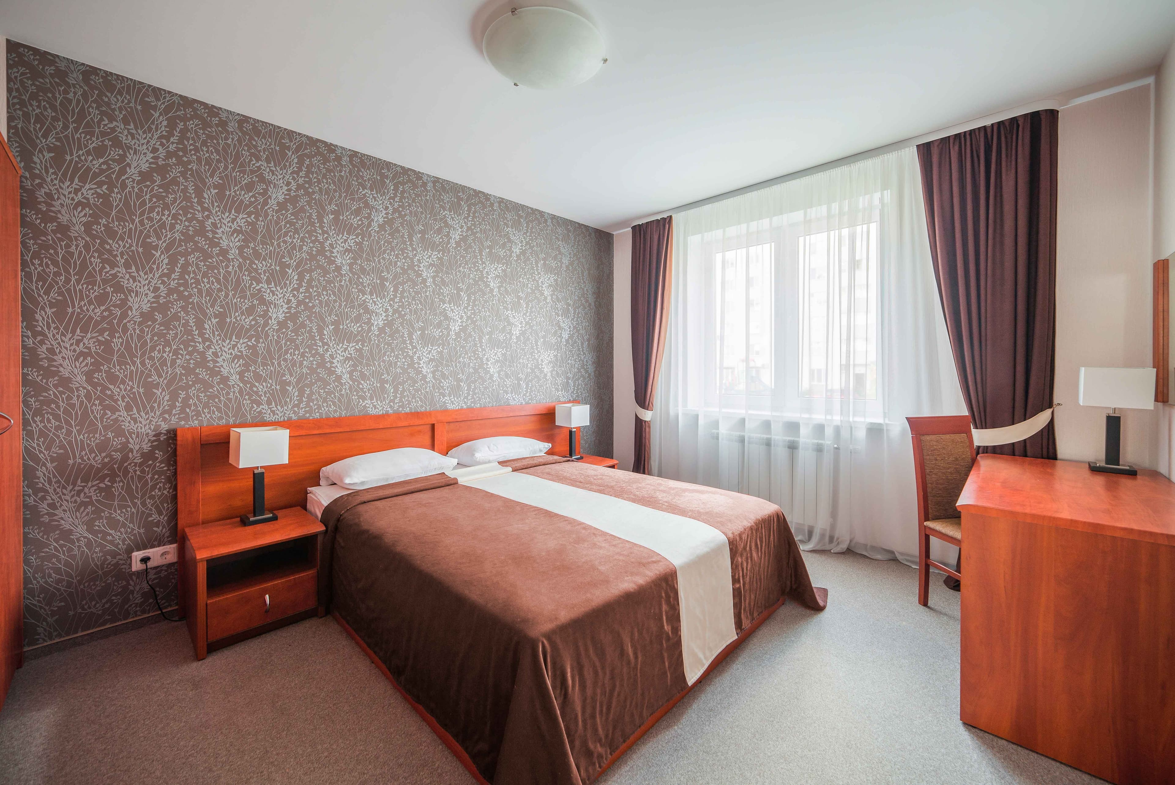 Семейные апартаменты — двуспальная кровать + диван, 84 м², Comfort Hotel Минск